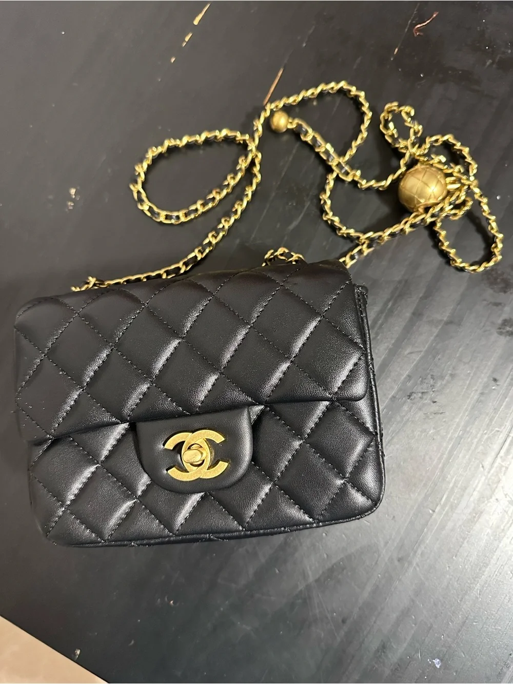 CHANEL Black Quilted Mini Crossbody with Gold Chain